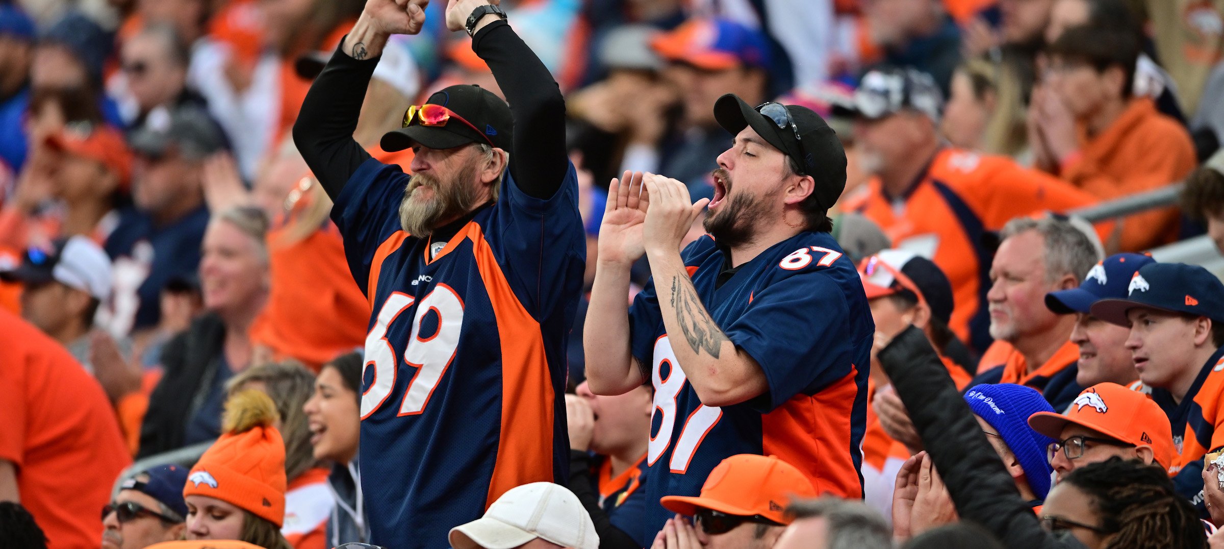 Fans in the stadium at a Denver Broncos game